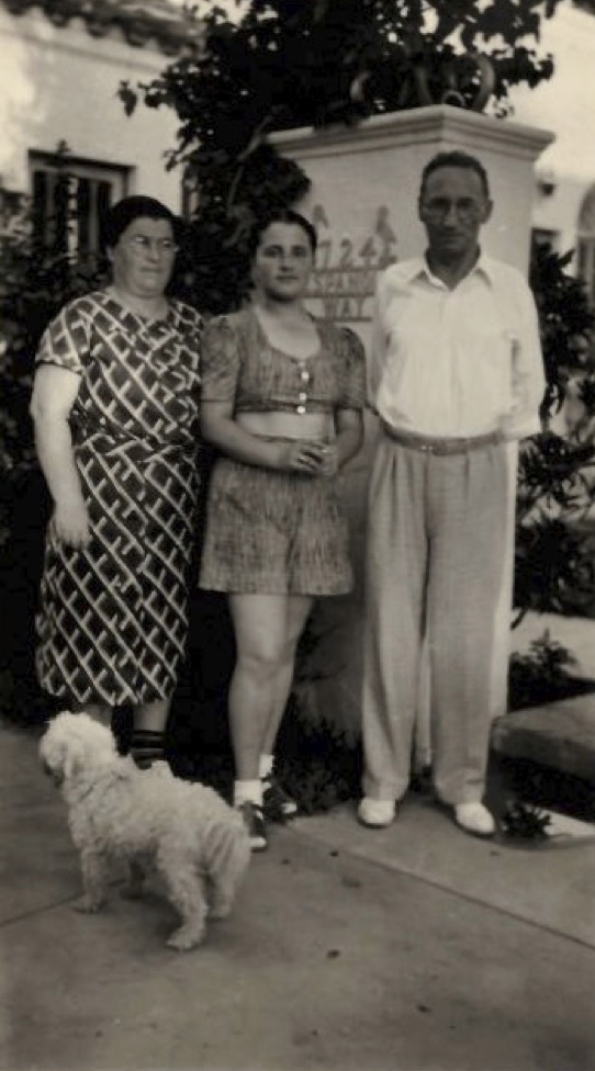 Photo of Sona, Esther as a teenager, and Jerome, with a small dog