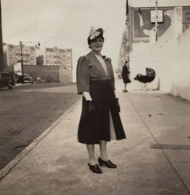 photo of Julia (Weiss) Schwartz, posing in street
