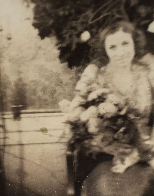 photo of Ruth Schwartz on her wedding day with bouquet